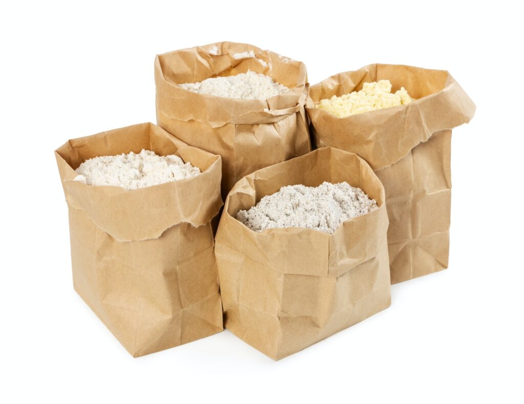 Flour and flour mixture in paper bags